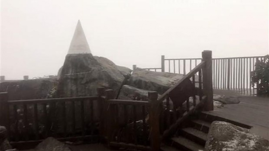 Fansipan Mt. peak in Lao Cai covered in ice and snow